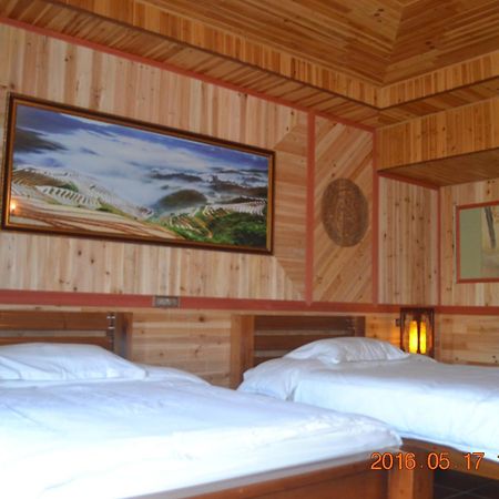לונגשנג Longji Holiday Hotel חדר תמונה