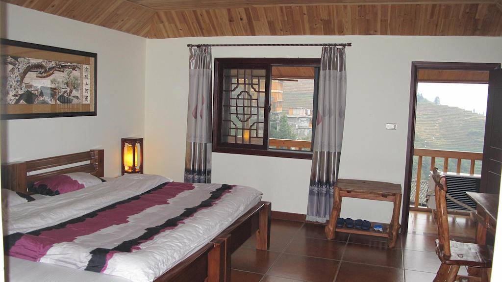 לונגשנג Longji Holiday Hotel חדר תמונה