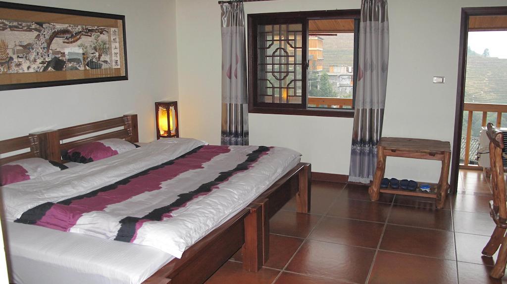 לונגשנג Longji Holiday Hotel חדר תמונה